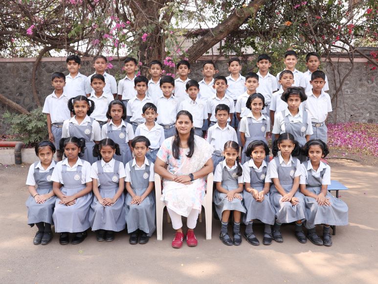  Std III B - Mrs. Asha Bhong