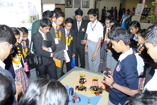 Students from Stds. V to IX displaying the Robots made by them in the school during Robotics Club.