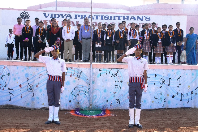 The senior member of the Sikkim group Mr. Diwaker unfurling the National Flag, followed by Inspection of the Parade. 